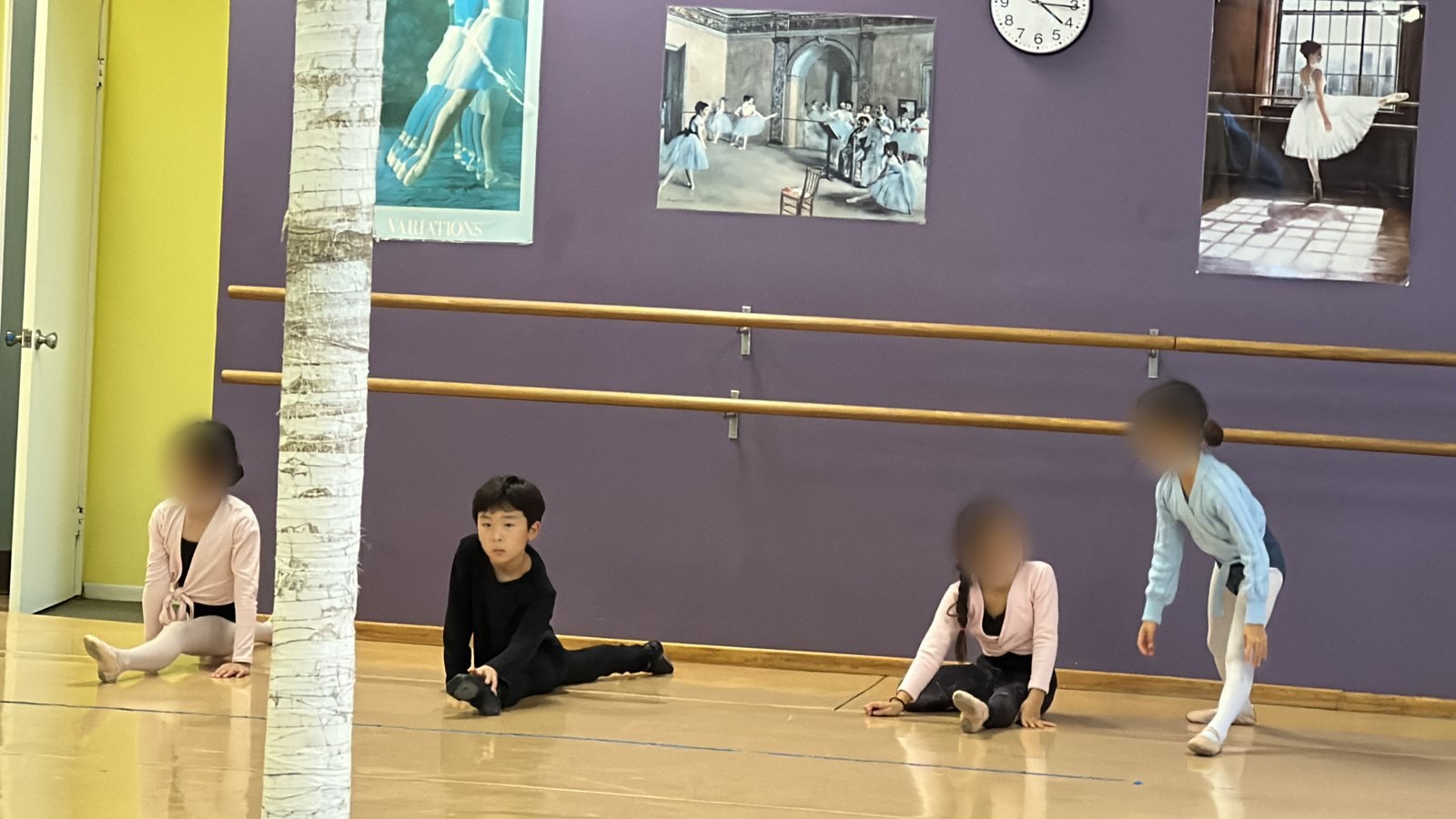 Floor stretches in ballet class
